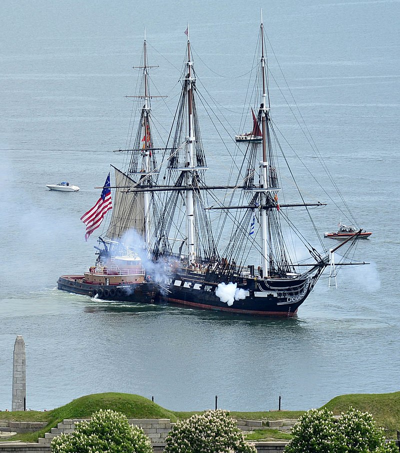 By Official U.S. Navy Page from United States of AmericaPetty Officer 3rd Class Alec Kra/U.S. Navy - USS Constitution fires its cannons as it is tugged through Boston Harbor., Public Domain, https://commons.wikimedia.org/w/index.php?curid=105875794